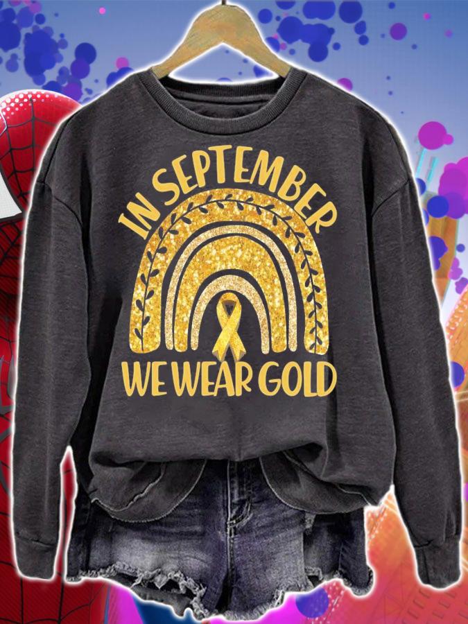 In September We Wear Gold Childhood Cancer Awareness Golden Rainbow shirt sweatshirt